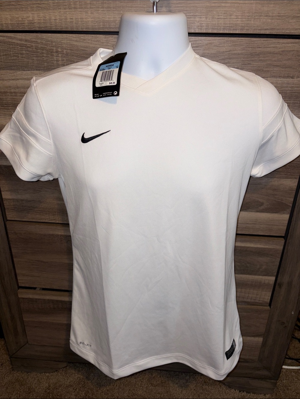 Nike White Short Sleeve V-Neck Athletic Shirt with Black Swoosh